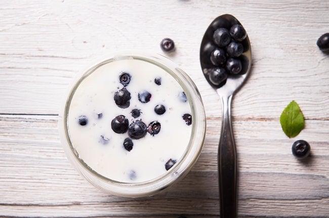 Healthy breakfast with Fresh greek yogurt on background.