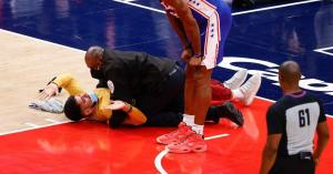 NBA Fan Tackled by Security After Running Onto Court During Wizards-76ers Game