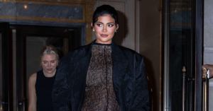 Kylie Jenner Bares Baby Bump in See-Through Lace Jumpsuit