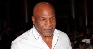 Mike Tyson Spotted in Wheelchair With Walking Stick at Miami Airport