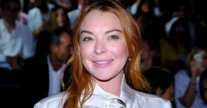 Pregnant Lindsay Lohan Shows off Growing Baby Bump in Swimsuit Photo