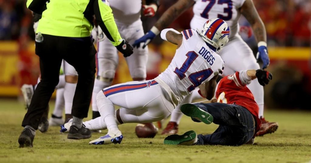 buffalo-bills-wide-receiver-stefon-diggs-tackles-fan-ran-field-playoff-game-1.jpg