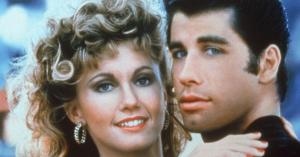 John Travolta Honors Olivia Newton-John in ‘Grease’-Themed Super Bowl Ad