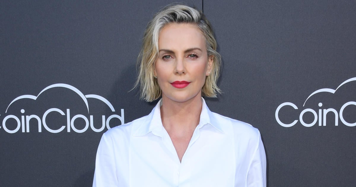 Super Bowl 2022 Charlize Theron Addresses 'Mystery' Man at Her Side