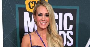 Carrie Underwood Goes Purple for CMT Awards Red Carpet