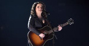 Watch Ashley McBryde Tearfully Accept Garth Brooks’ Surprise Grand Ole Opry Invitation