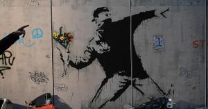 Banksy Urges Shoplifters to Descend on Guess Store After Stolen Art Accusation