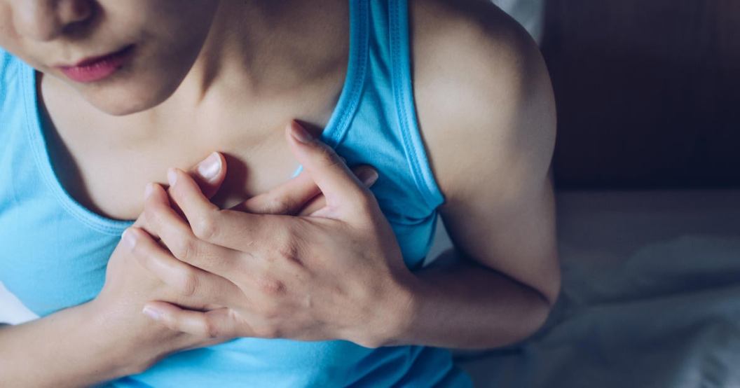 woman-having-suffering-from-chest-pain-or-heart-attack.jpg
