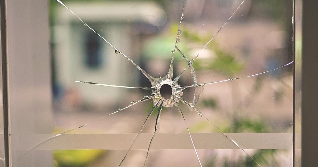 bullet-hole-on-glass-window.jpg