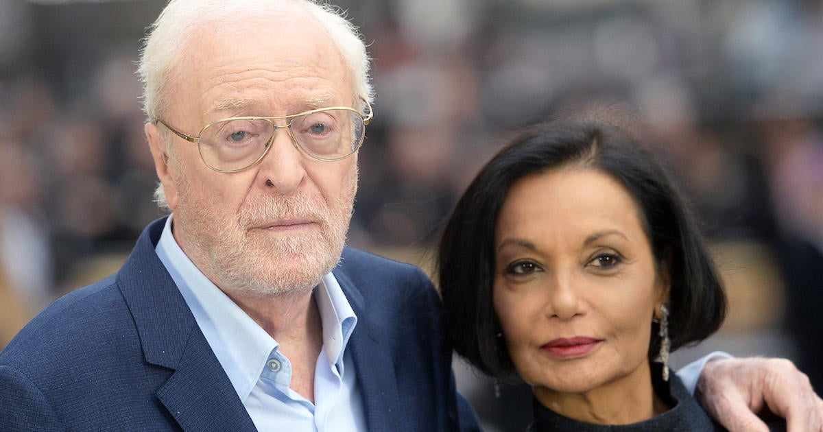 How Michael Caine Met His Wife Shakira - PopCulture.com