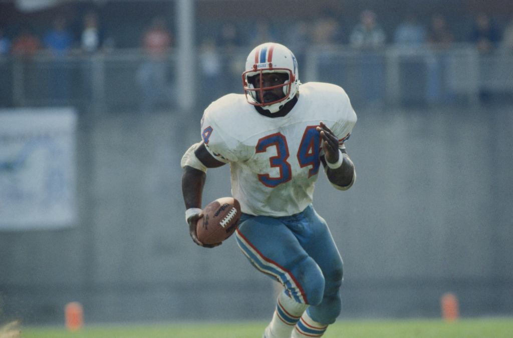 Football Player Carrying Ball