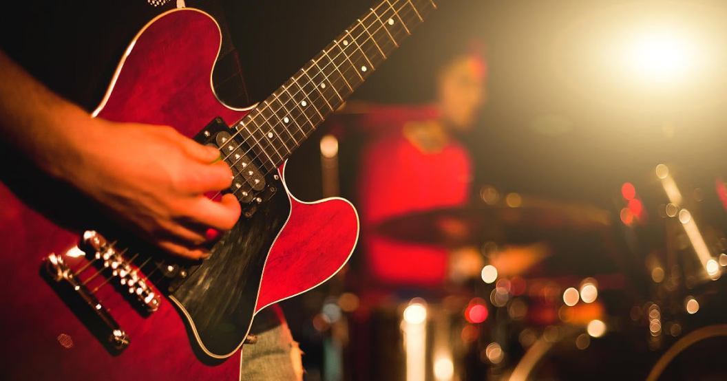 rock-band-man-playing-guitar.jpg