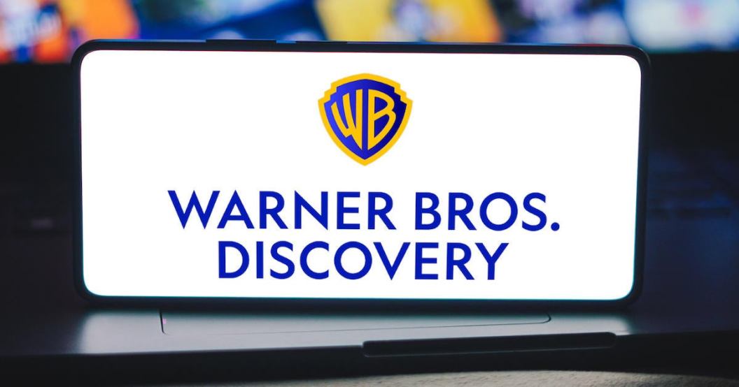 In this photo illustration, the Warner Bros. Discovery logo