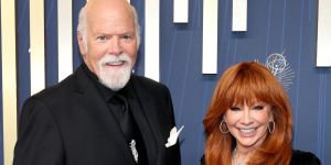 Reba McEntire and Boyfriend Rex Linn Hold Hands on Emmys Red Carpet — See the Photos