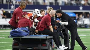 NFL Quarterback Suffers Dislocated Elbow During Loss